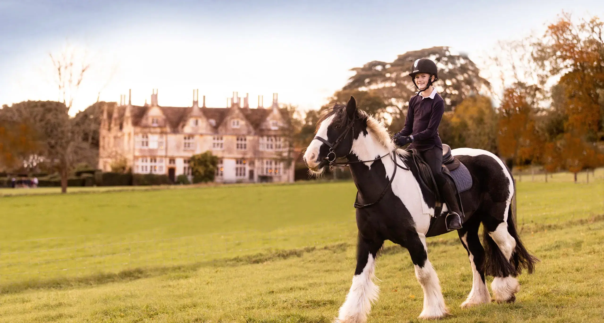 Student Riding Horse on Hanford Grounds