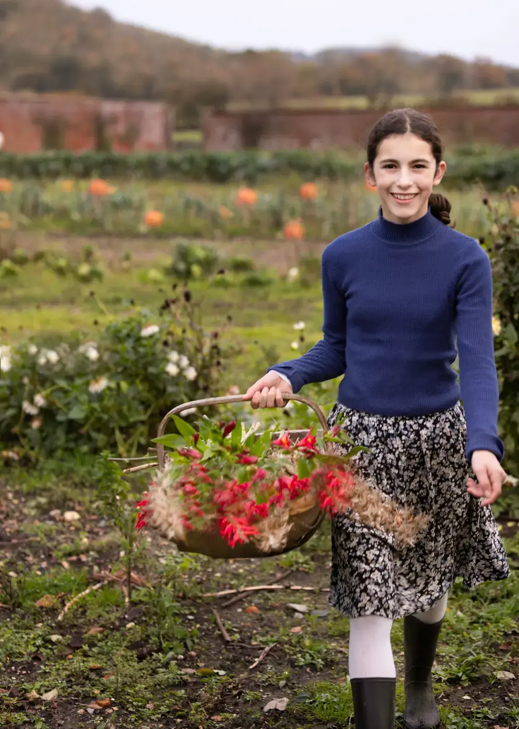 Student Carrying Basket of Flowers