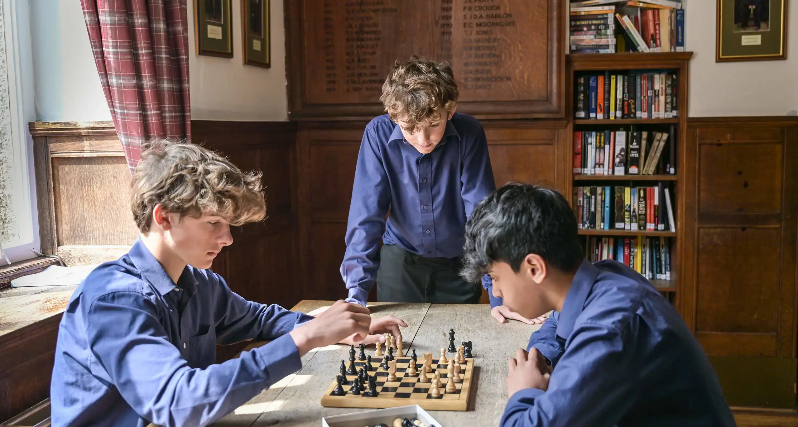 Students Playing Chess in Their Dorm