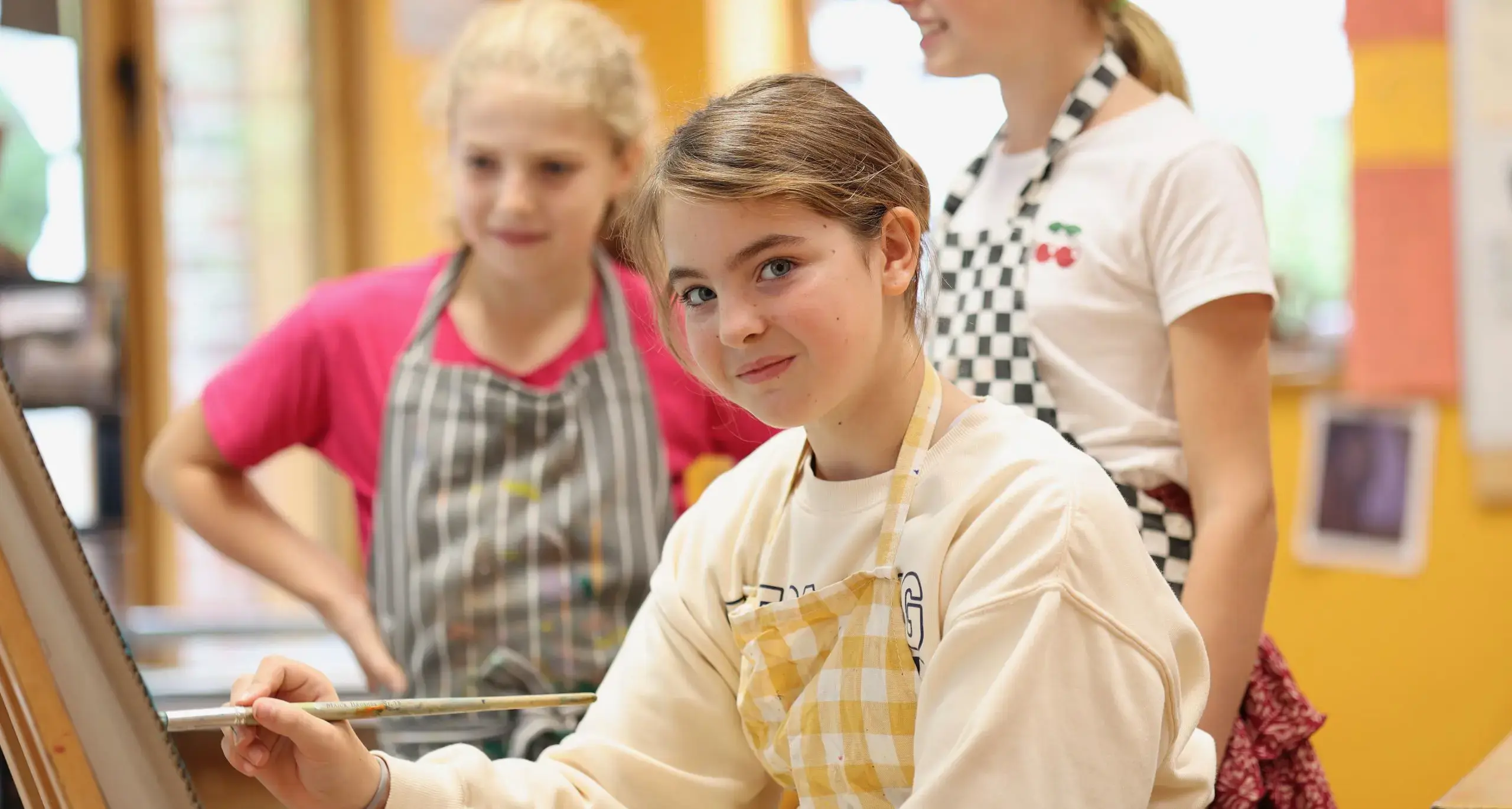 Students Painting in Art Class