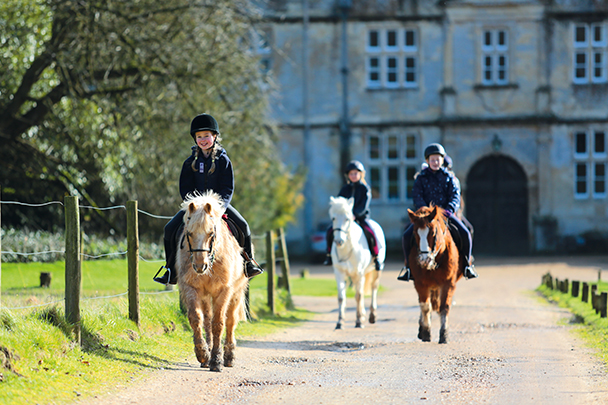 Girls Riding Ponies