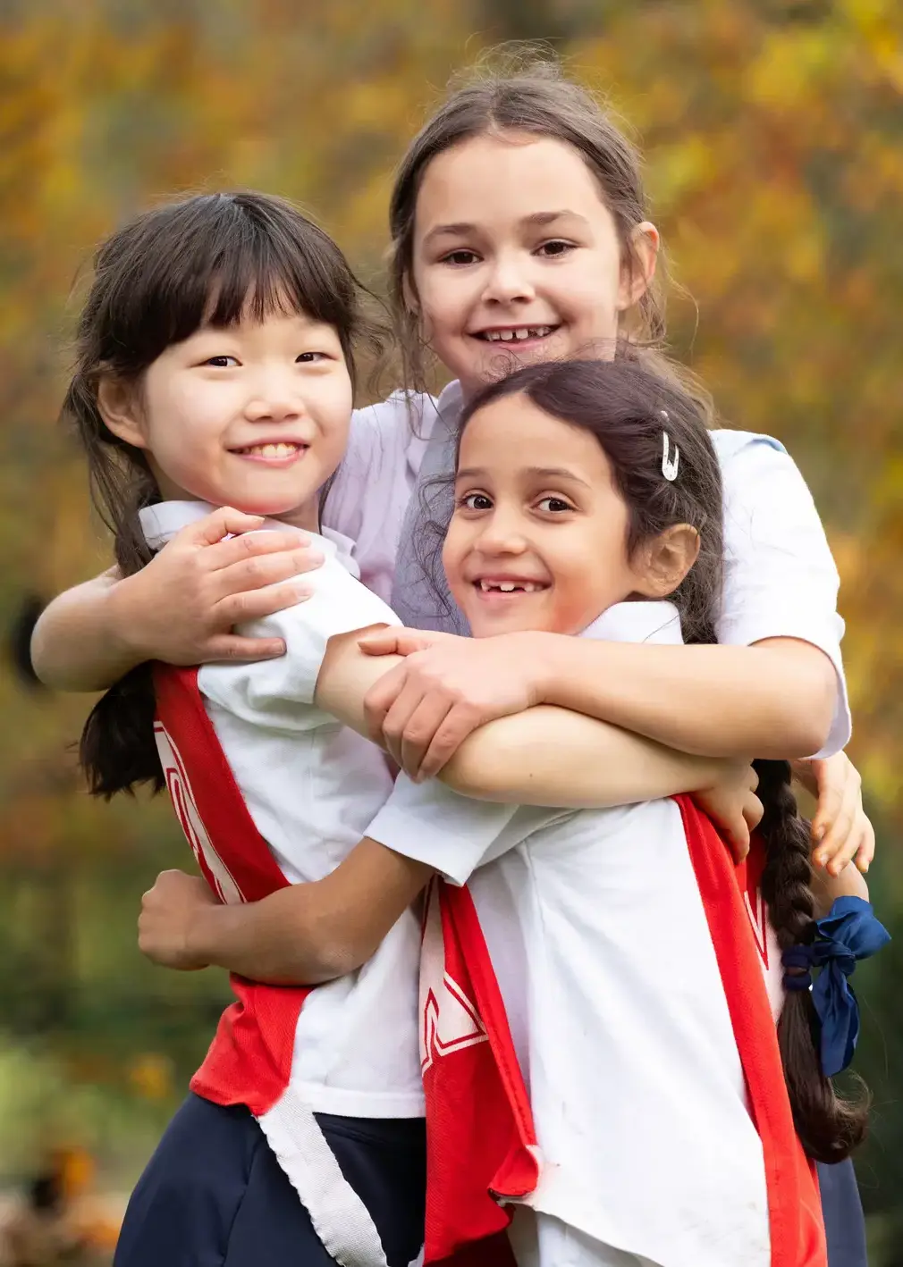 Students Hugging During Sports Game
