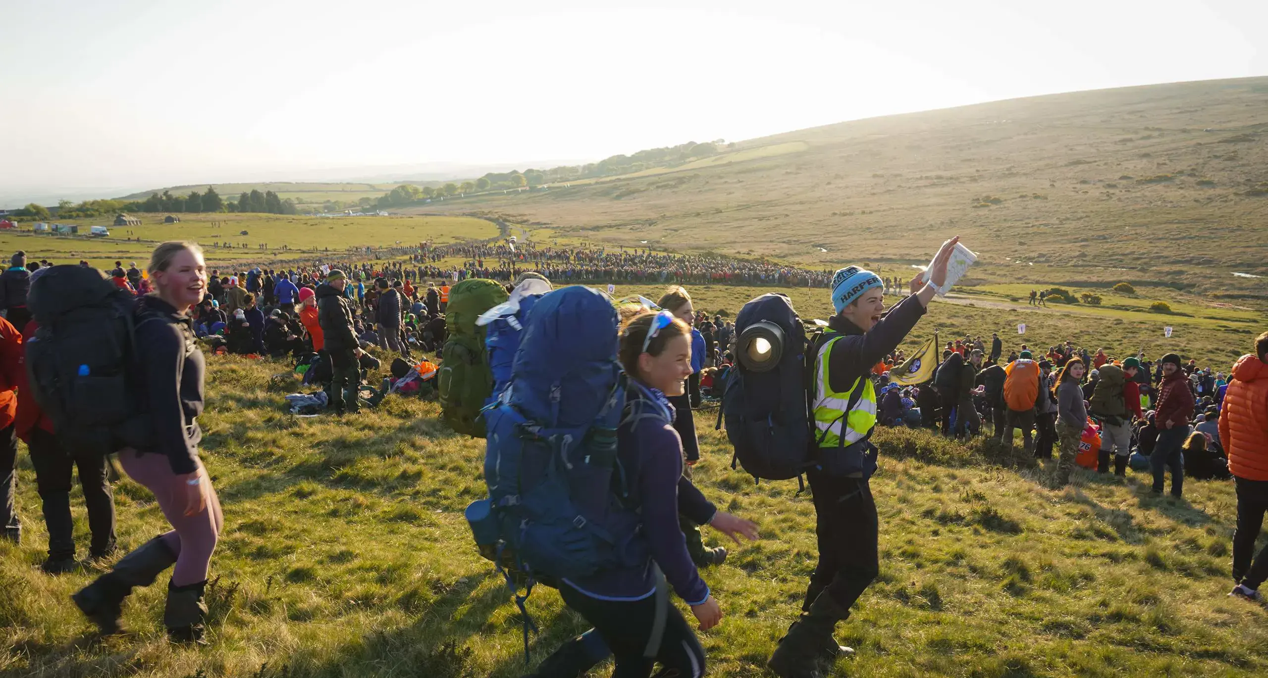 Students celebrating on hill
