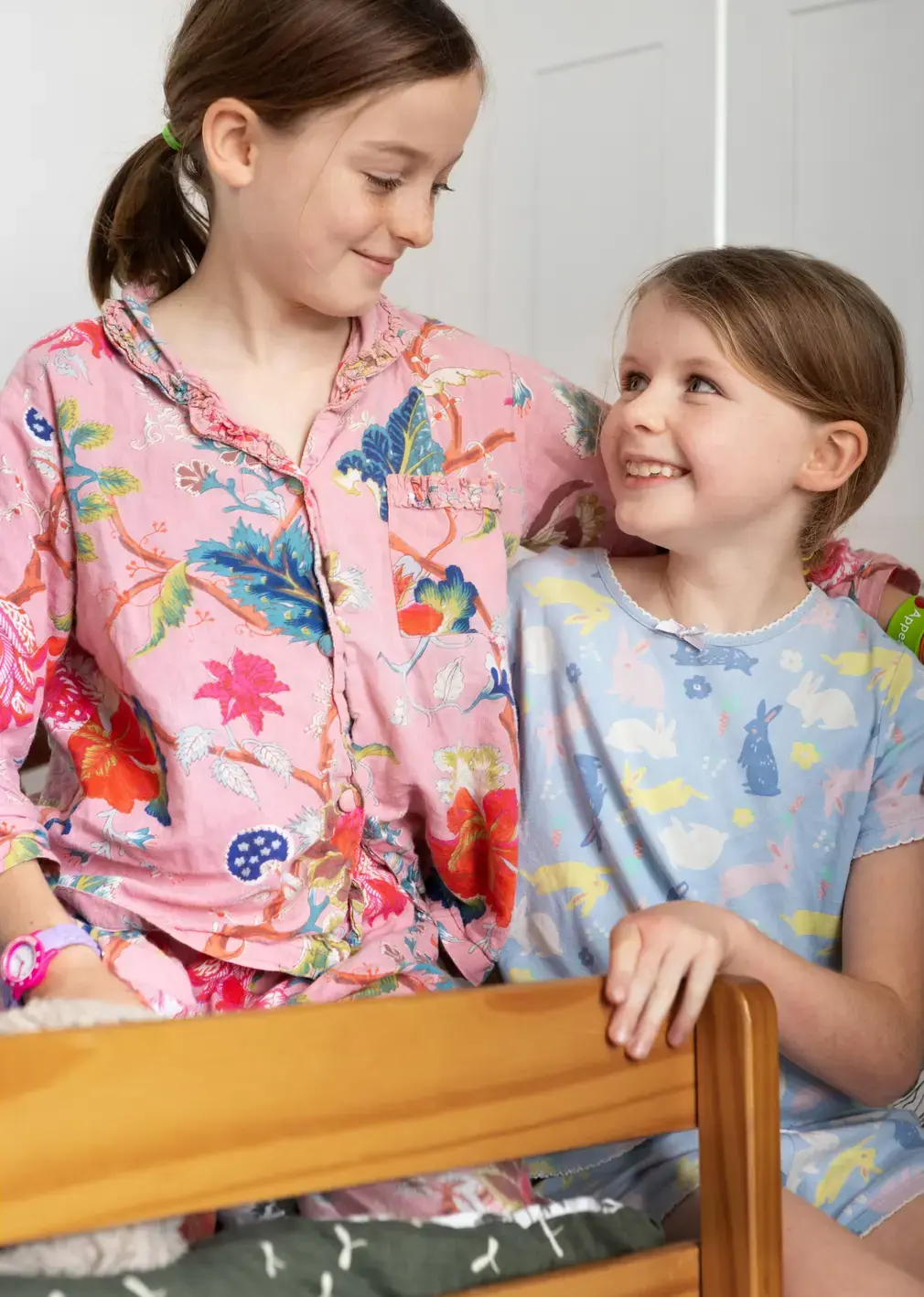 Young and Older Boarder Smiling at Eachother