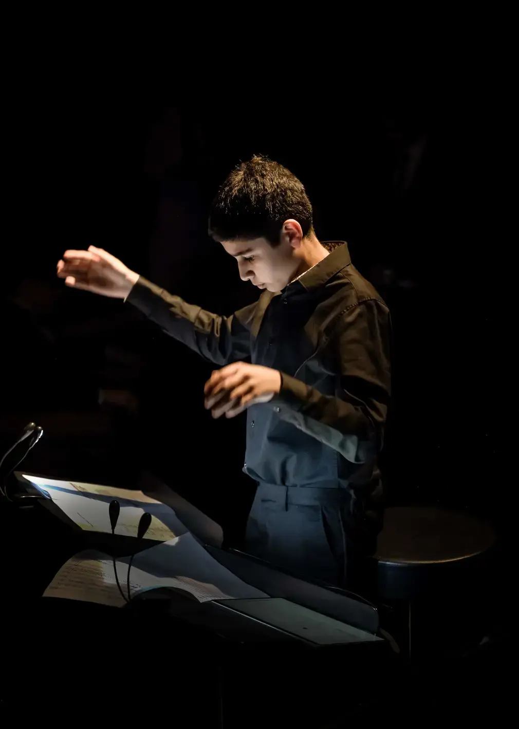 Student Leading Choir