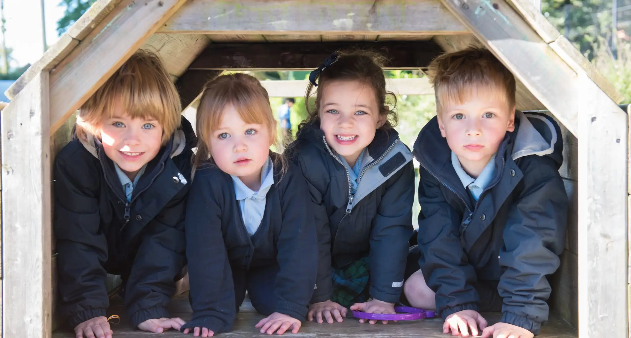 Reception Students Playing on Jungle Gym Together