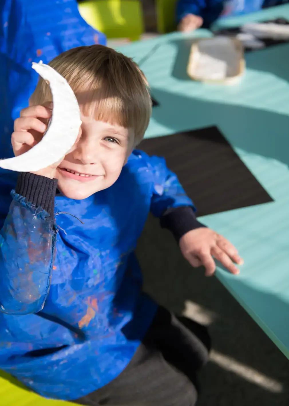 Reception Student in Art Class with Crescent Moon Stamp