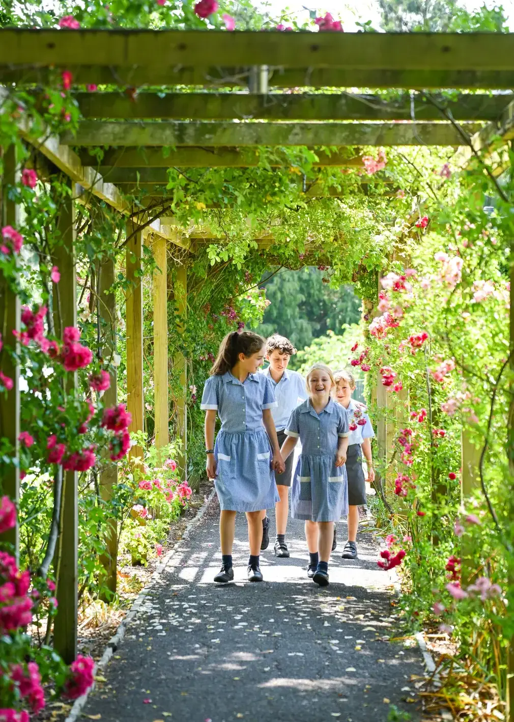 Students Walking in Campus Garden