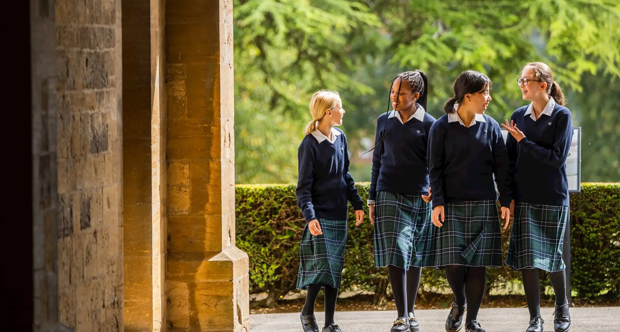 Students Walking and Talking on Campus