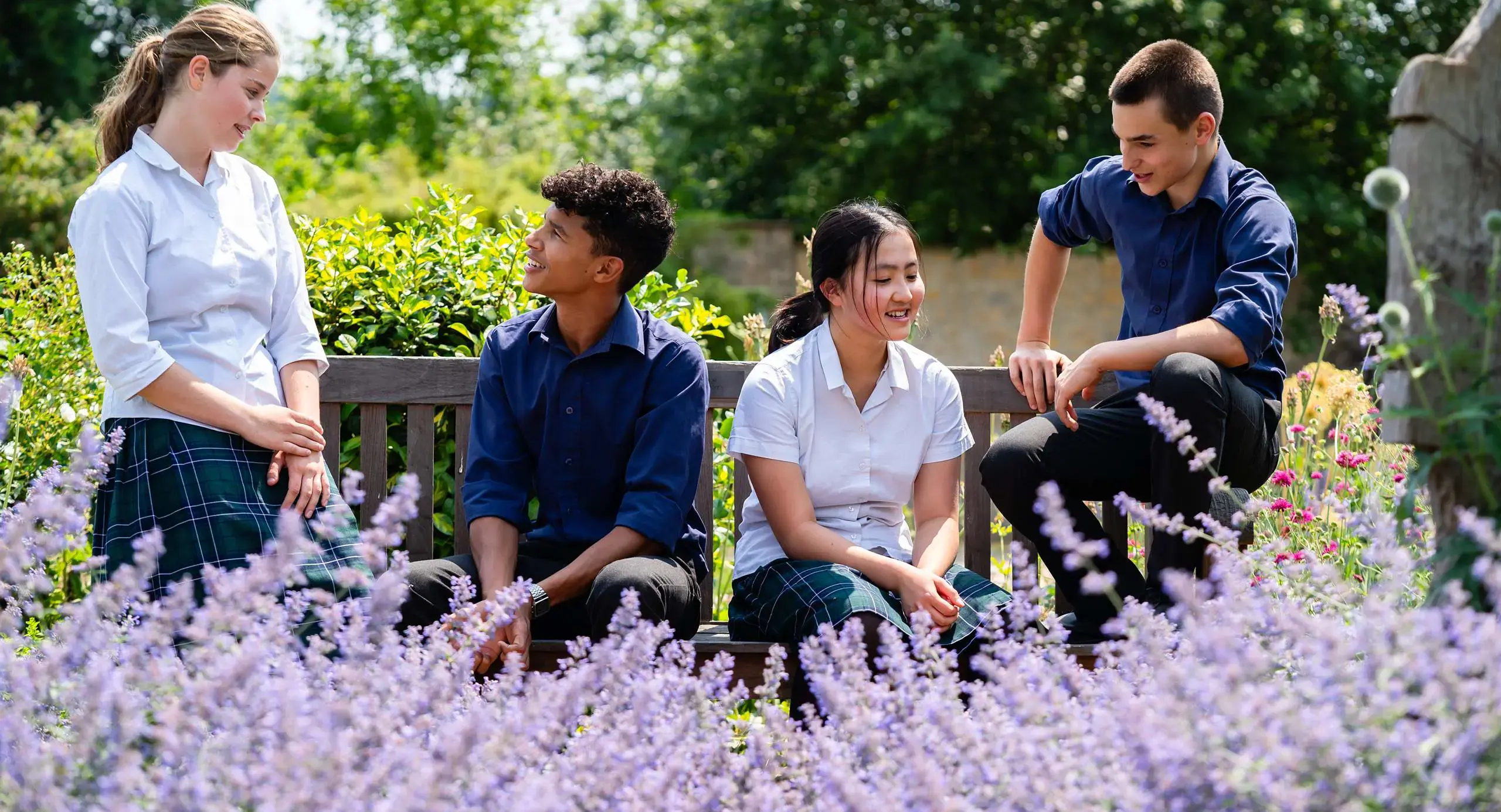 Students Sat Talking in Garden