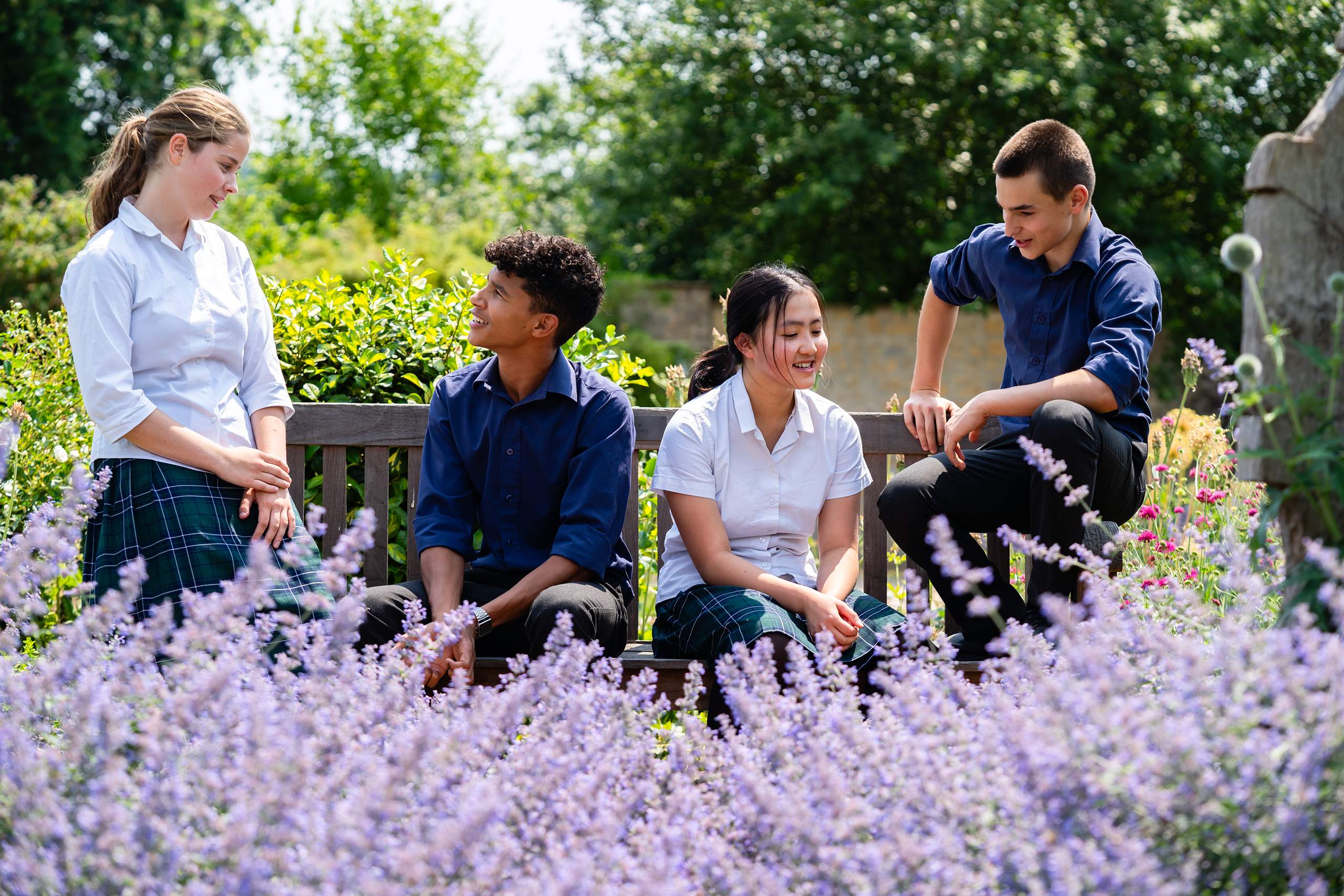 Students Sat Talking in Garden