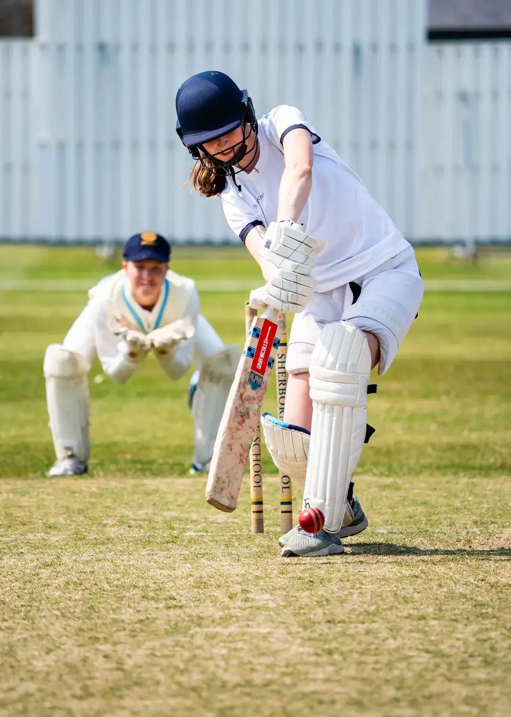 Students Playing Cricket
