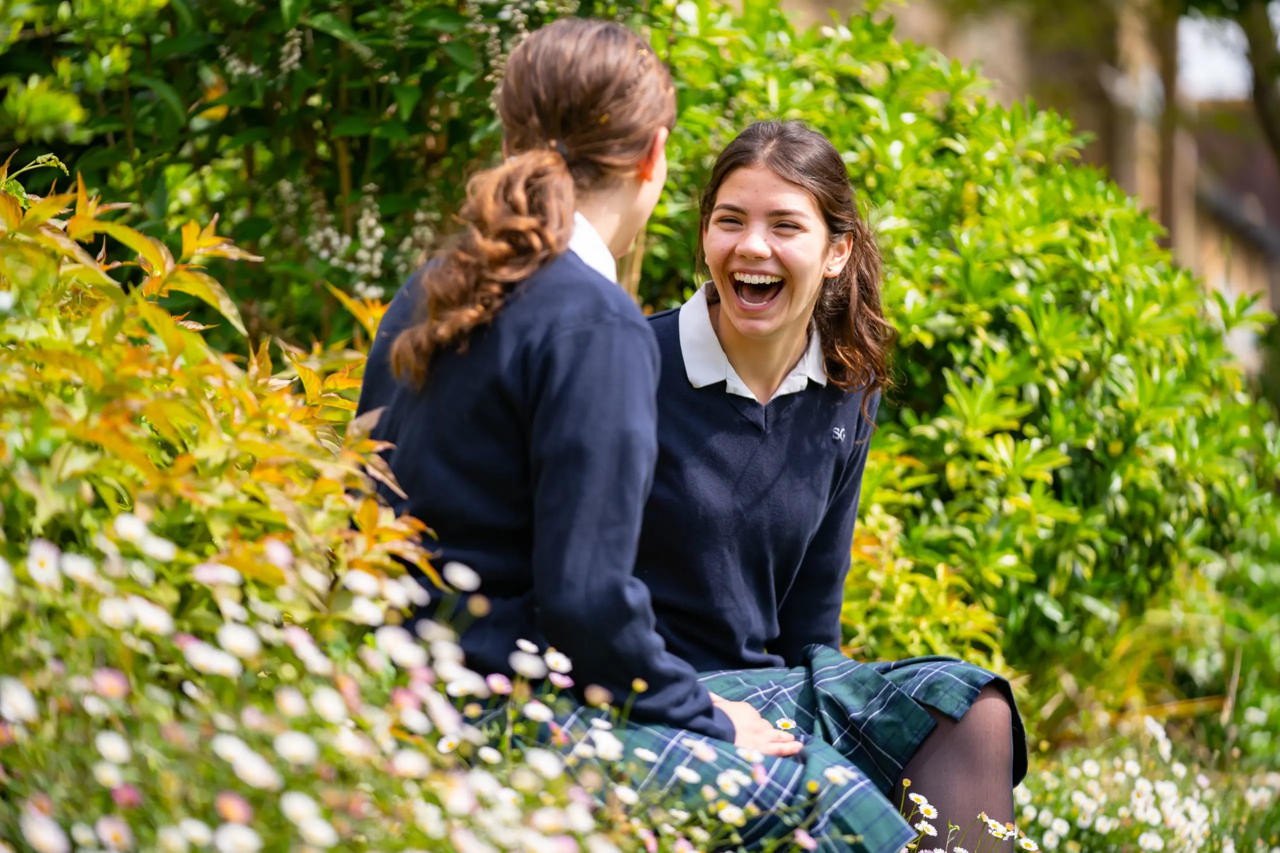 Students Chatting in Garden