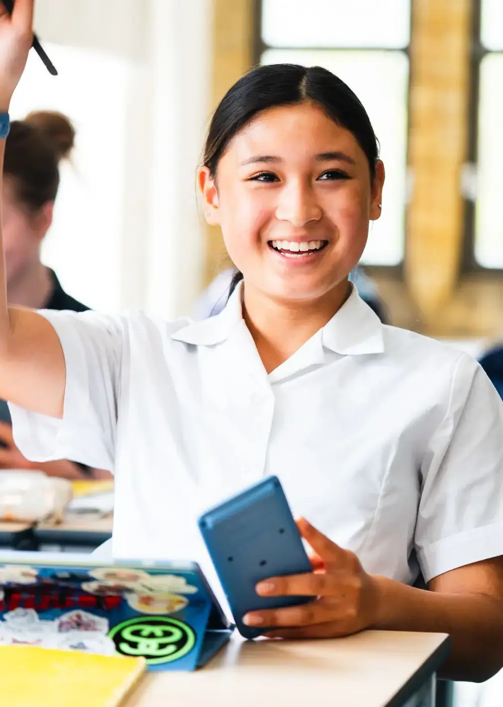 Student in Class Raising Hand