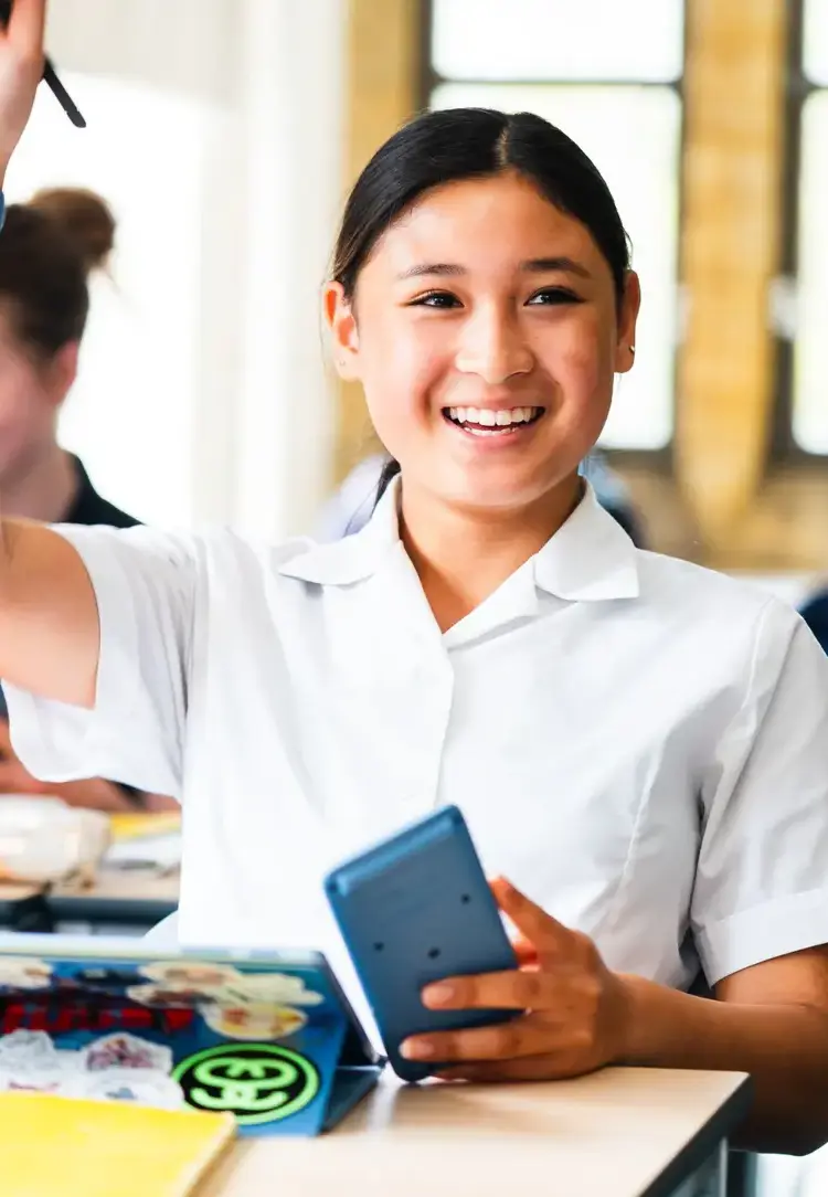 Student Asking Teacher a Question and Smiling