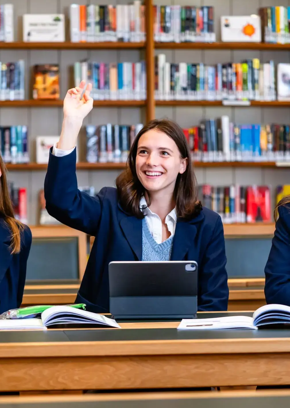 Student in Class Raising Hand