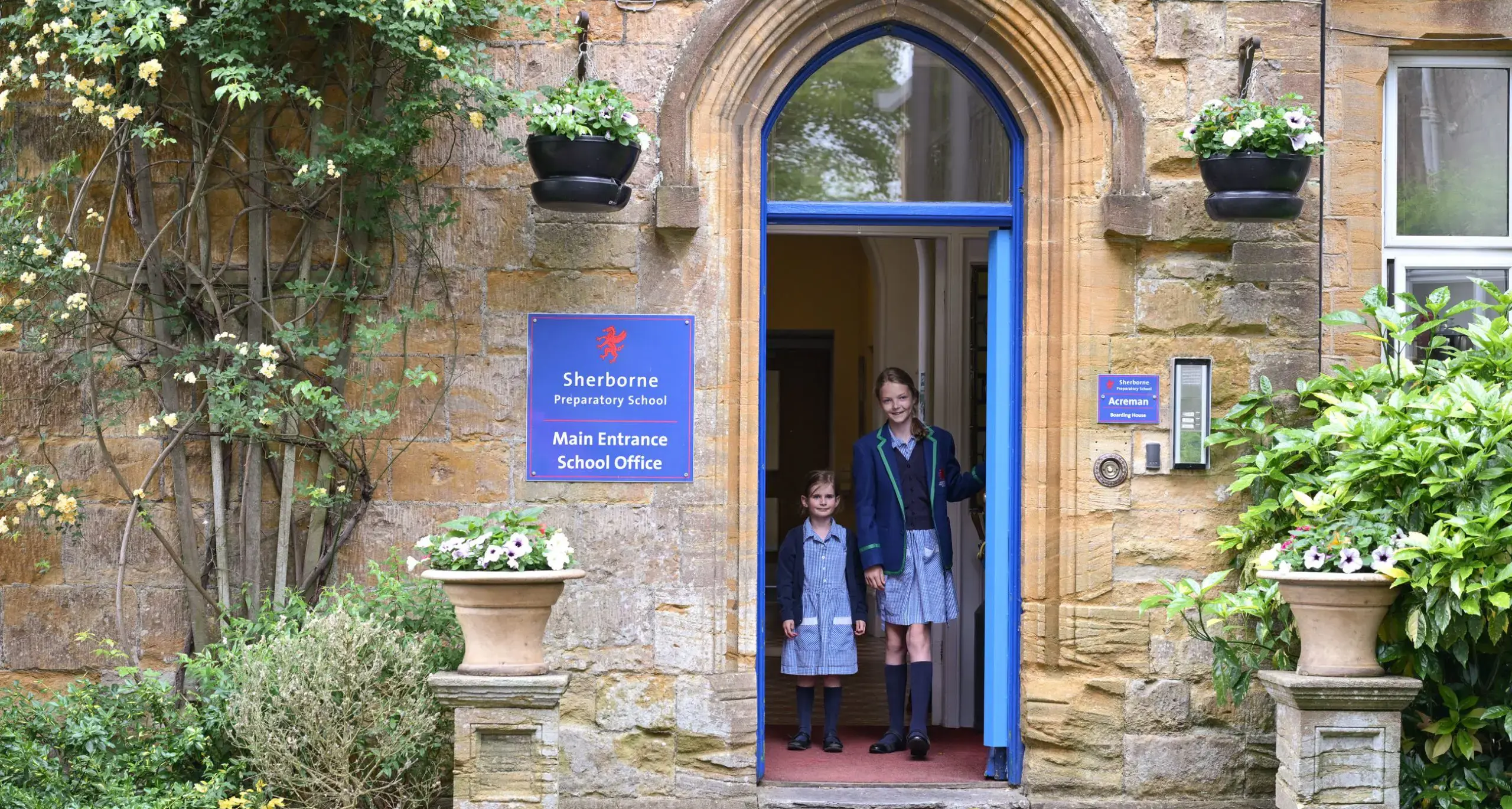 Students in doorway of Sherborne Prep