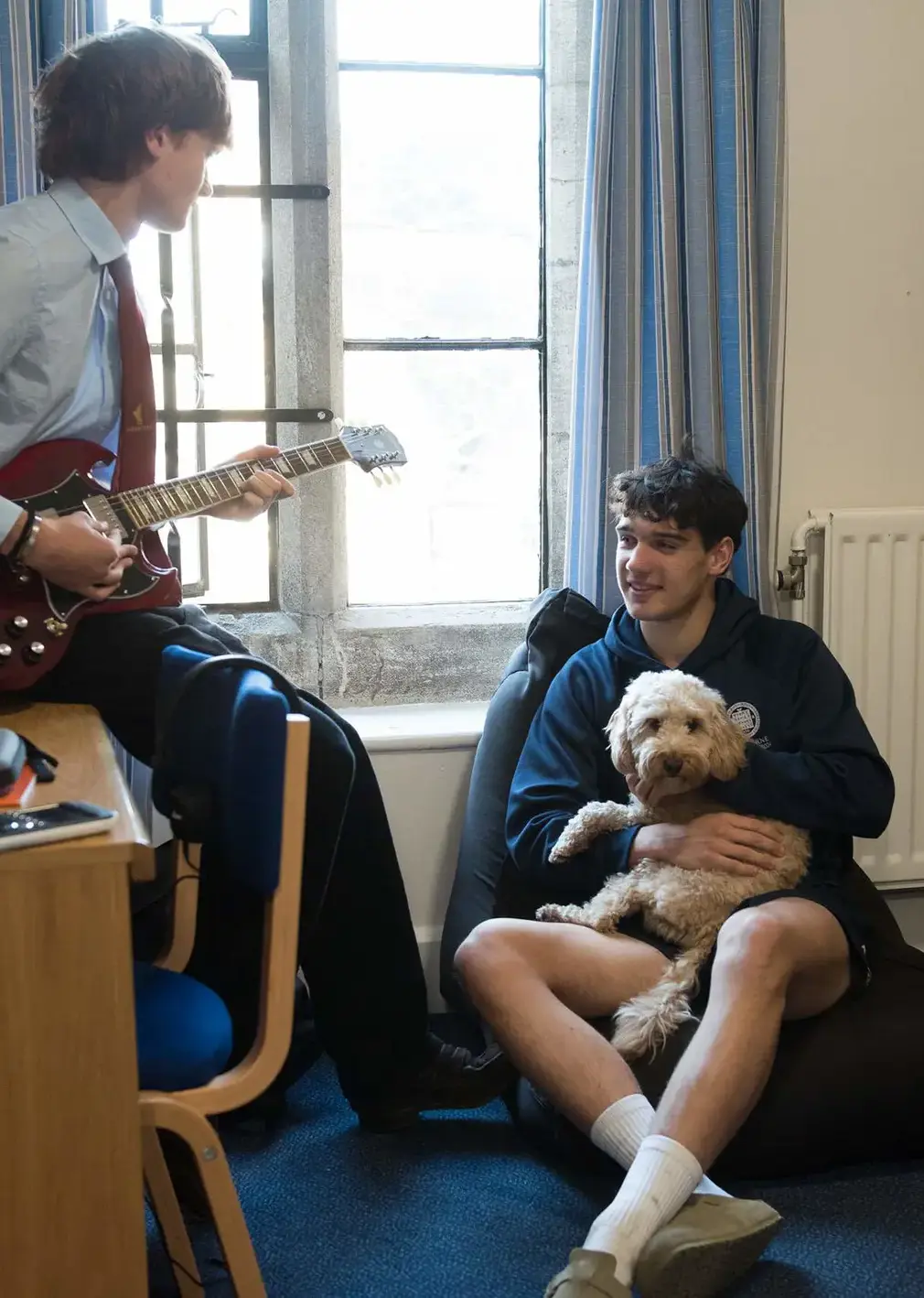 Boys Hanging out in Their Dorm