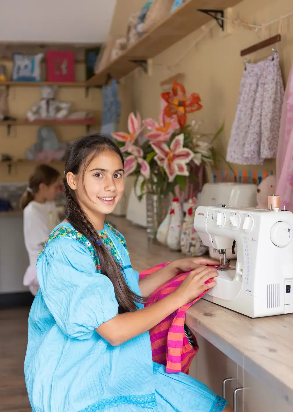 Students Sewing on Sewing Machine