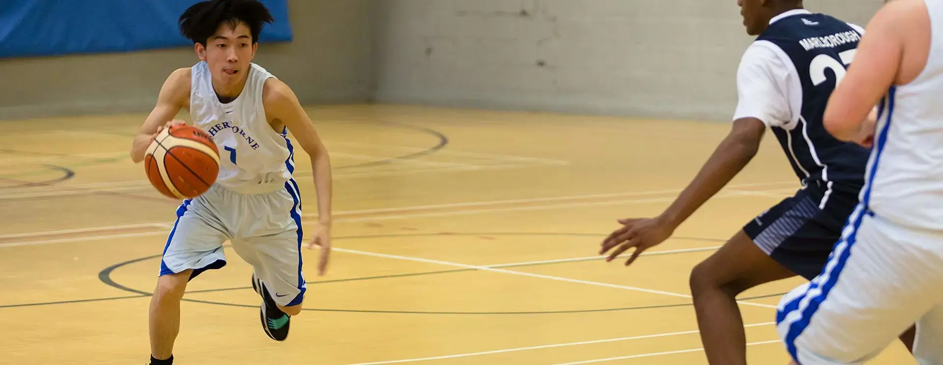 Students Playing Basketball