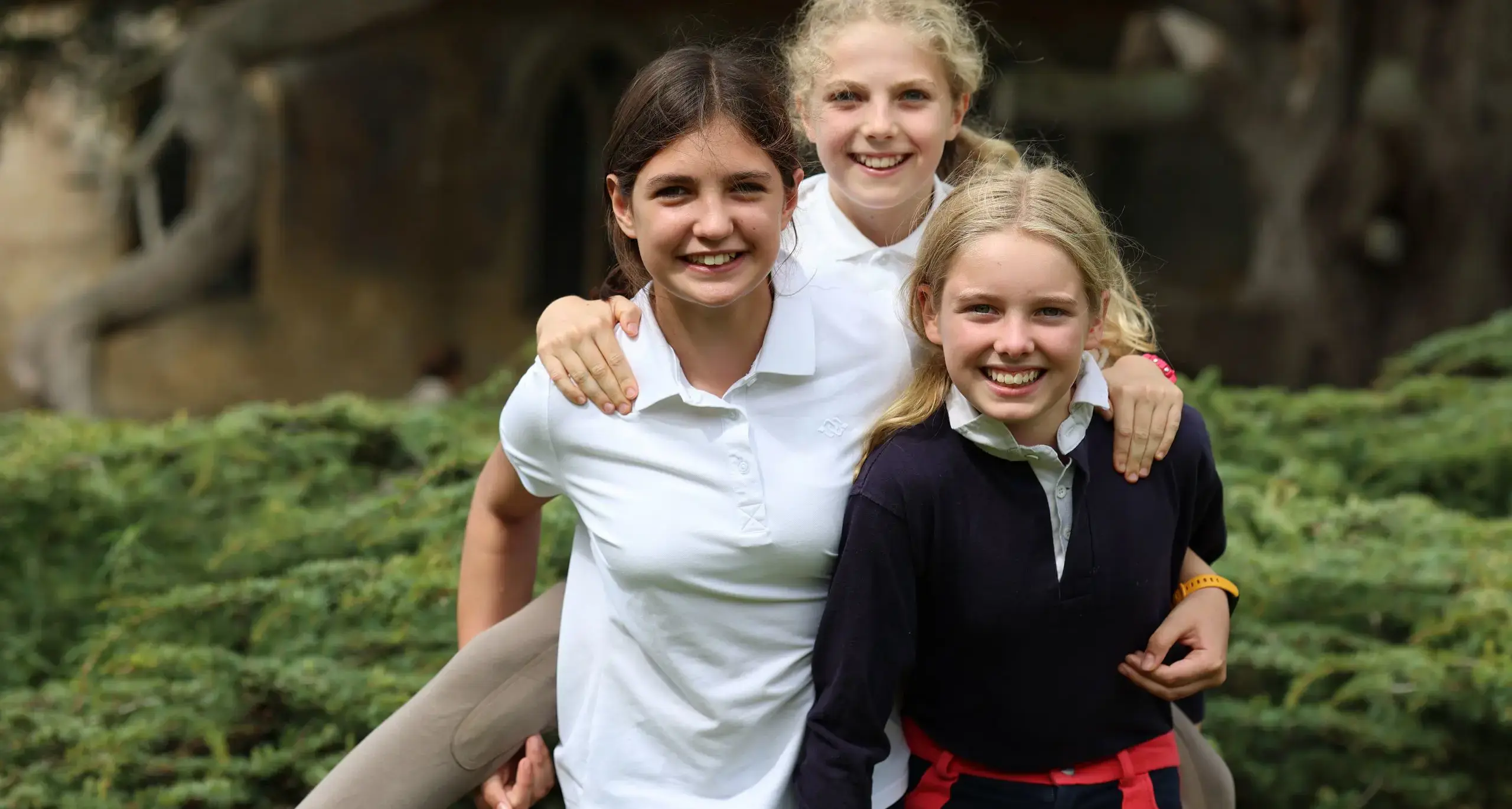 Student Piggy Back Riding and Smiling