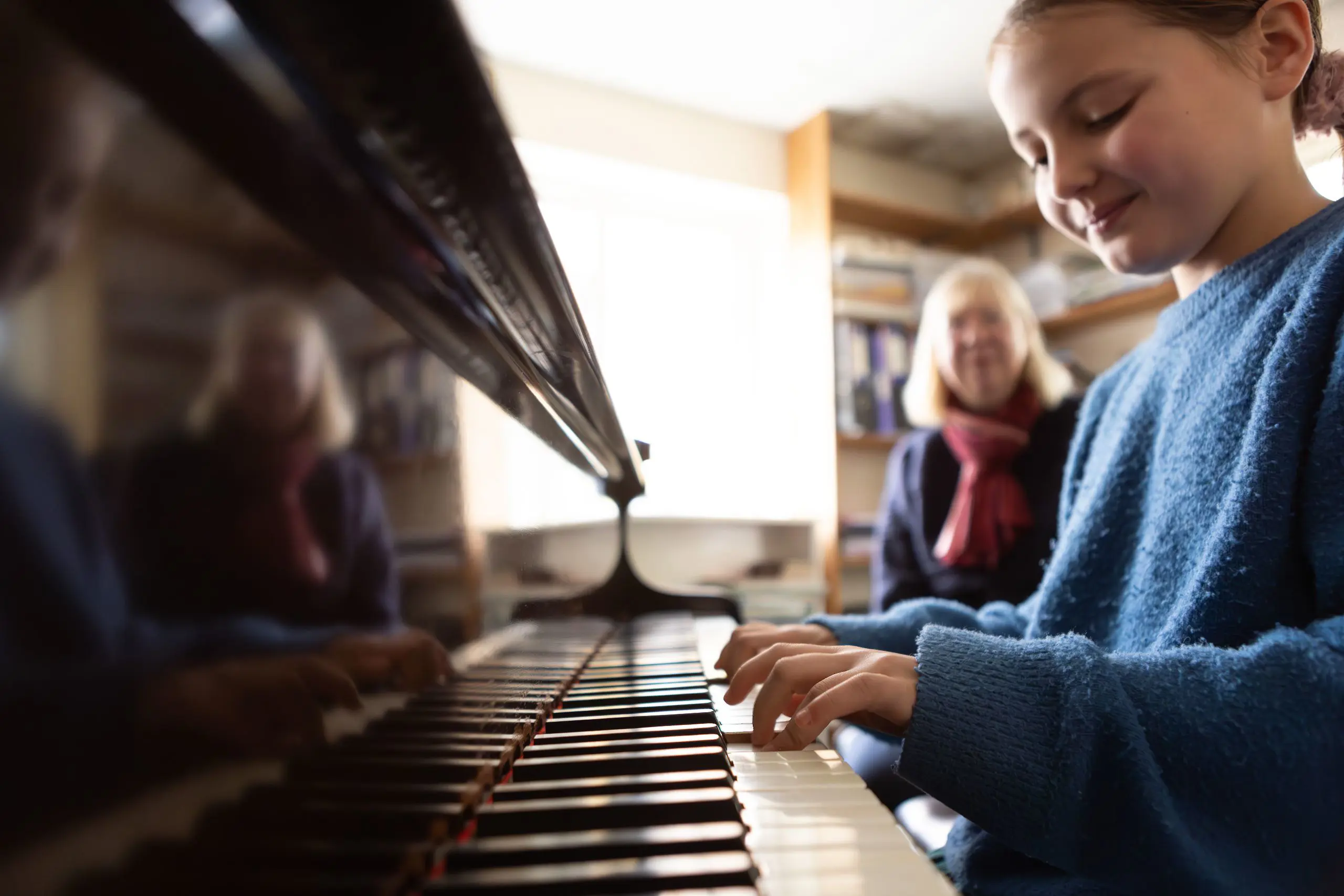Student Doing a Piano Lesson
