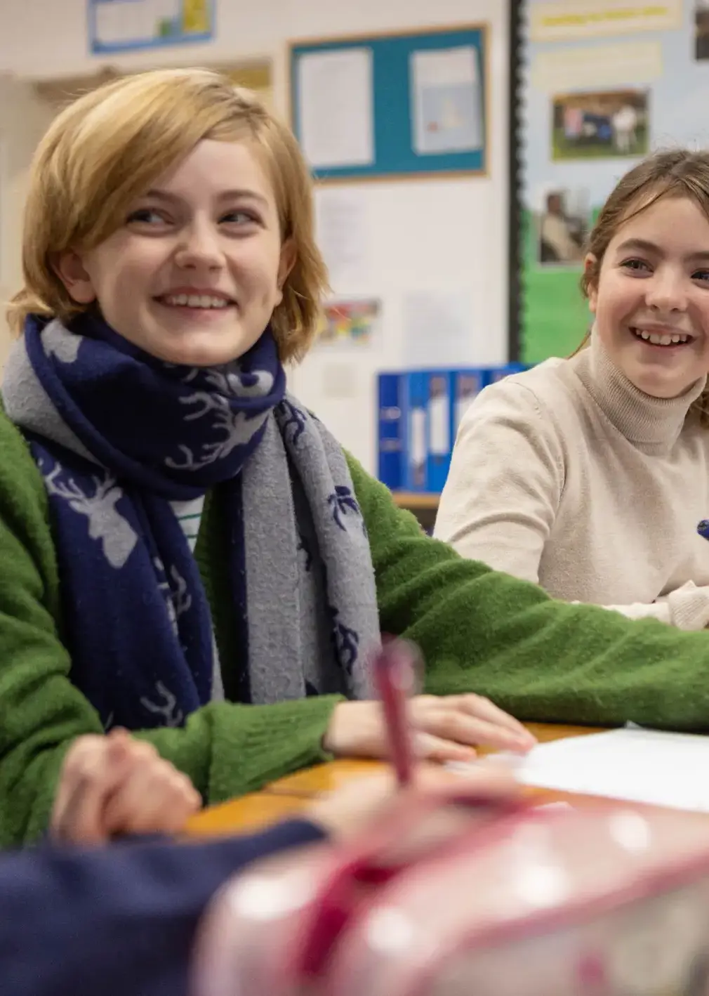 Students smiling in classroom
