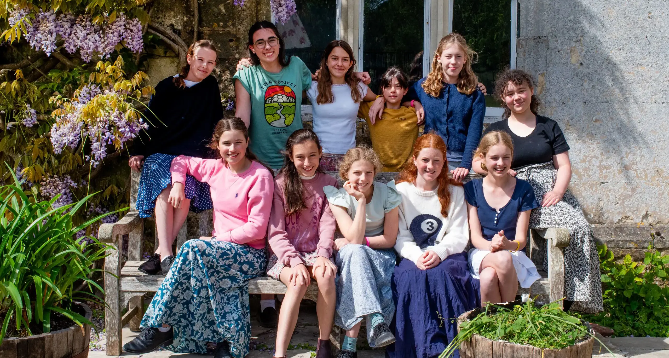 Senior Prep Girls Smiling and Posing on Bench