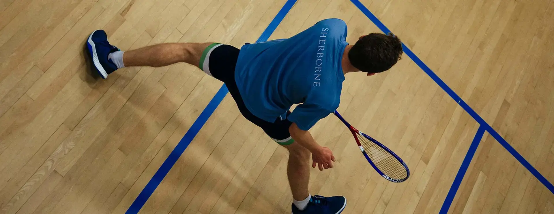 Student Playing Squash